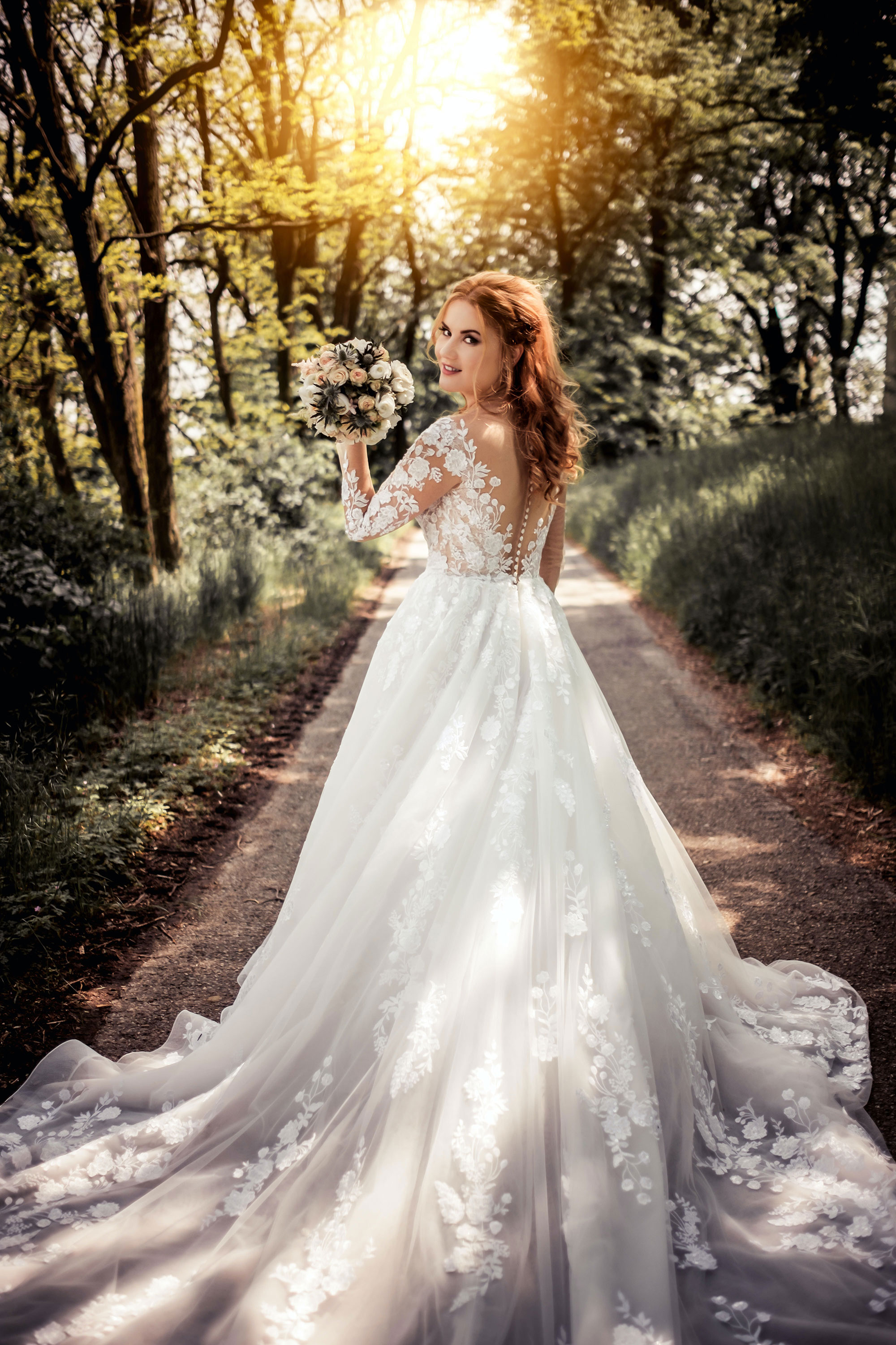 Women in wedding dress in forest