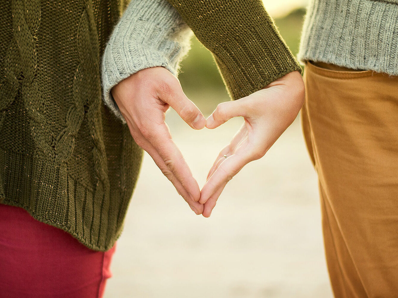 Couple holding hands