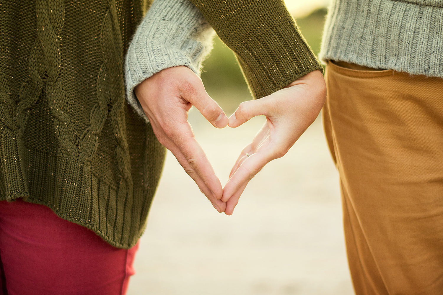 Couple holding hands